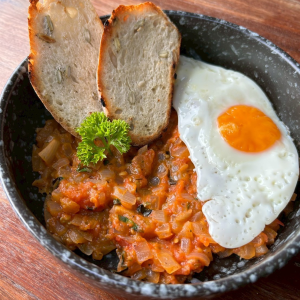 Shakshuka with Fried Egg and Bread